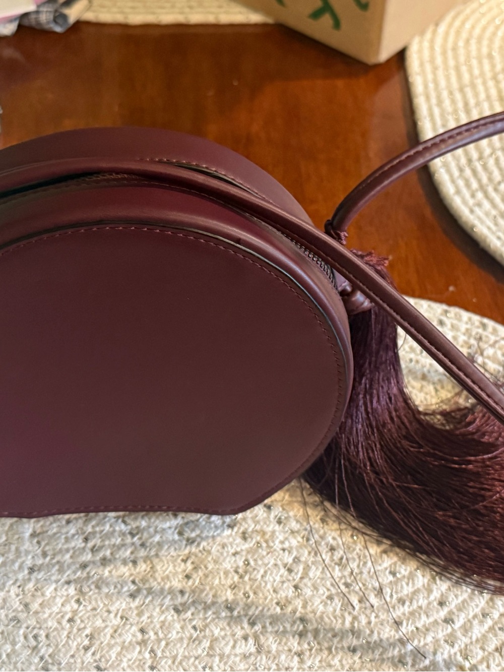 Coach and Four Round Burgundy Leather Crossbody with Tassel